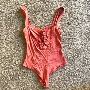 Mauve body suit